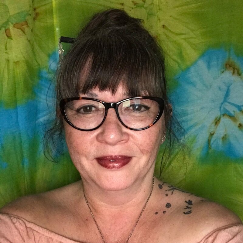 Women with glasses smiling