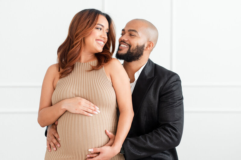Expecting mom and dad in studio maternity session by MSP Lifestyle photographers David and Meivys of MSP Photography