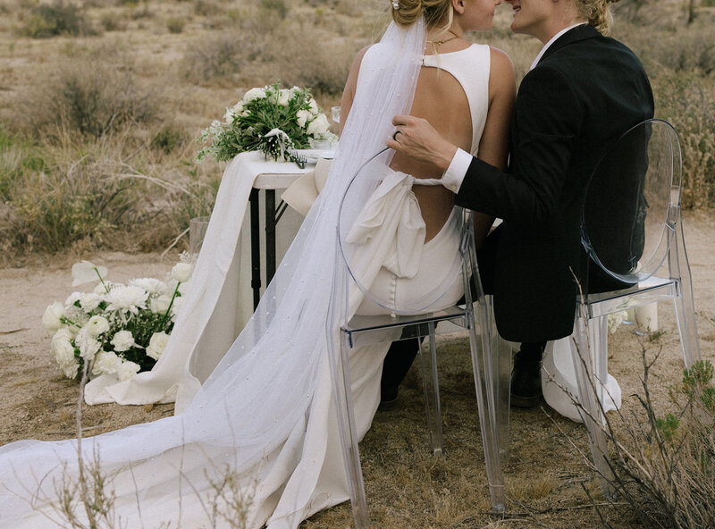 editorial bride and groom at their Joshua Tree elopement table