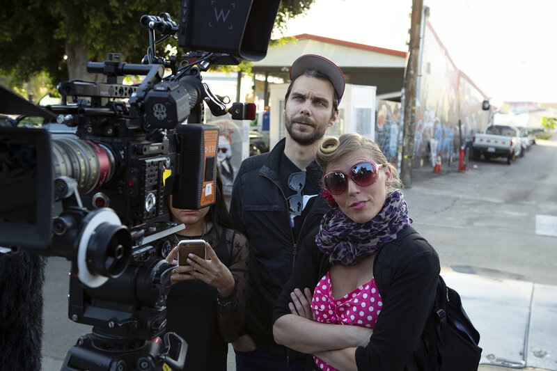 Ylva Erevall on set during the TRESemmé campaign, directing the shoot with a focused team and professional camera setup outdoors.