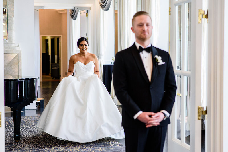 San Francisco wedding photographer captures emotional first look at Westin St. Francis with elegant hotel interior
