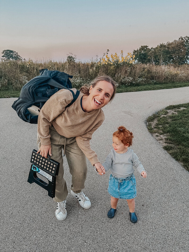 Rachel_Borkow_holding_hands_with_toddler
