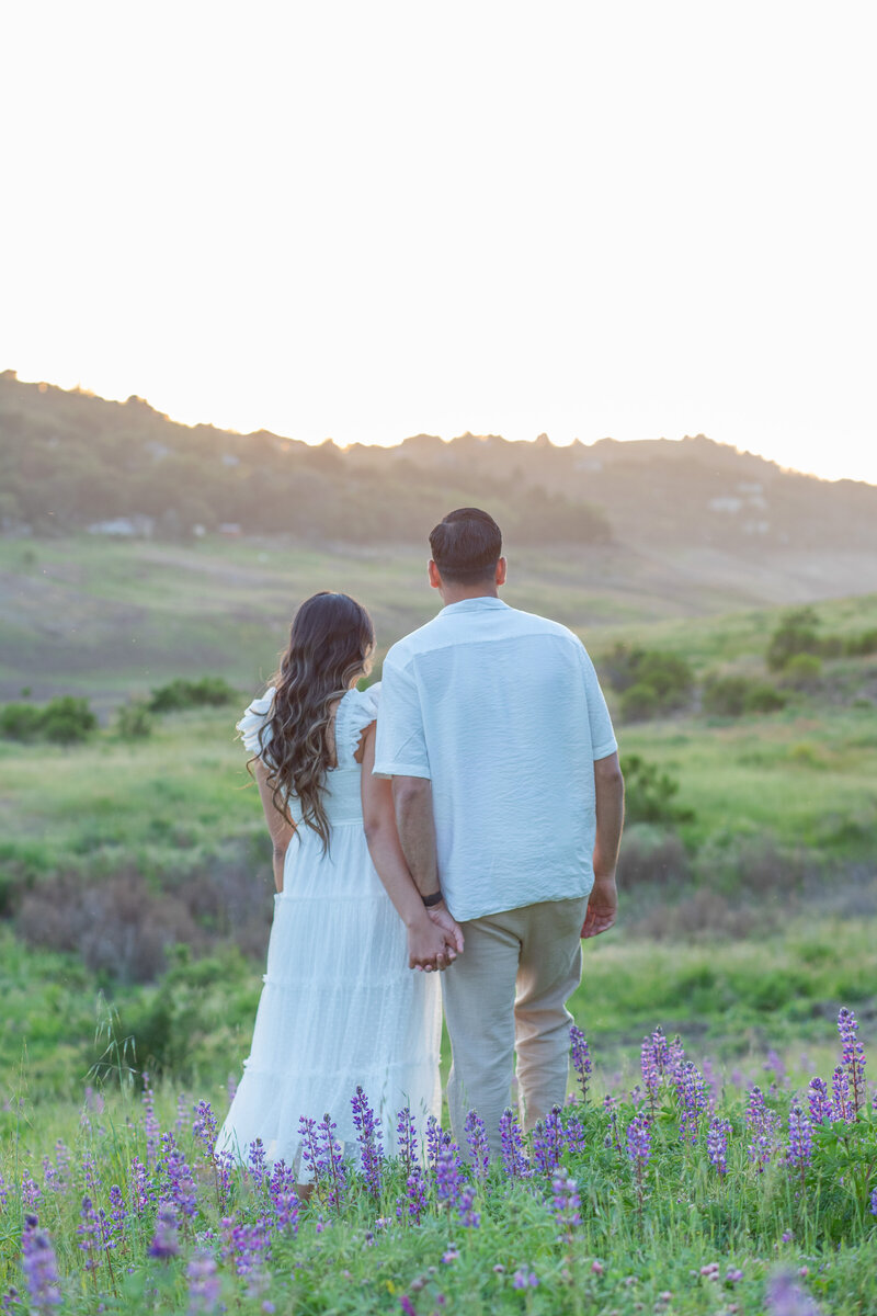 Bride and groom walk up memorial steps at their DC wedding