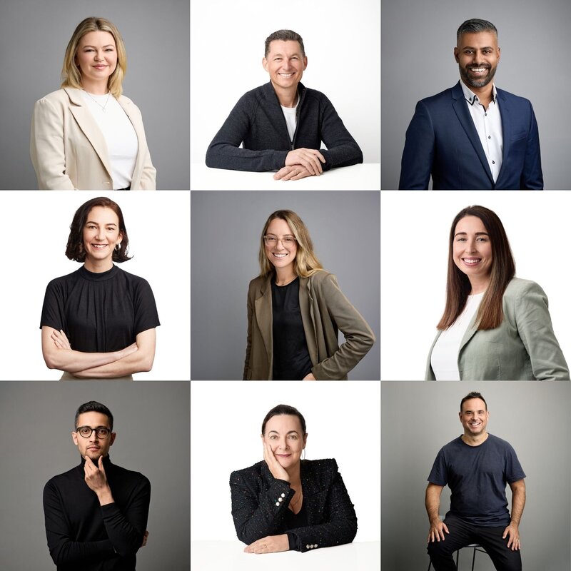 9 different headshots of corporate people against plain backgrounds shot in studio.