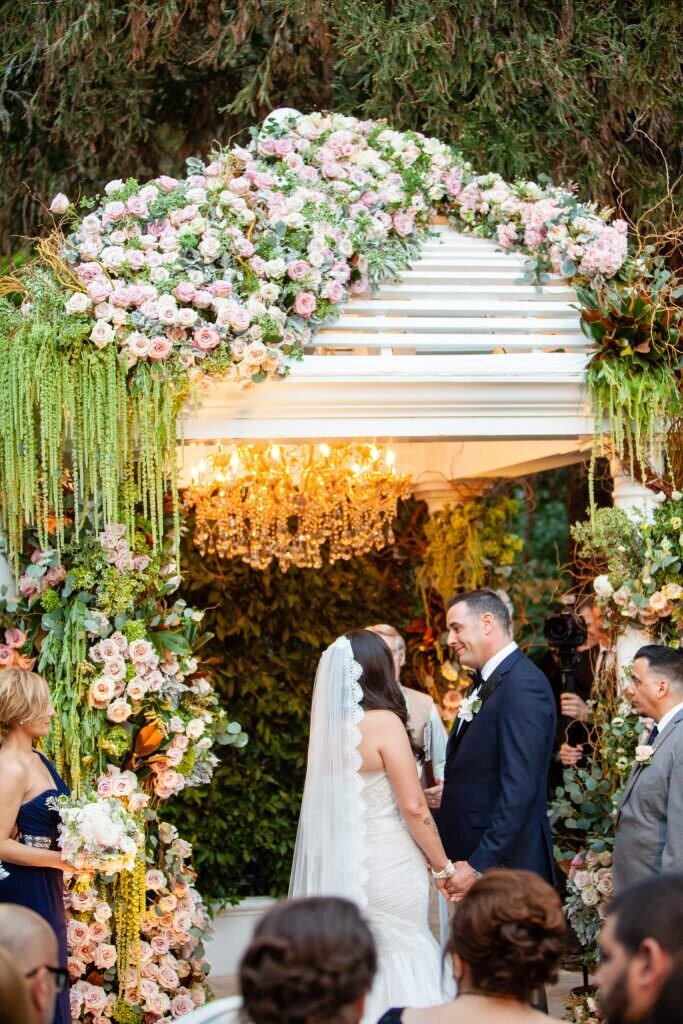 A wedding couple kissing