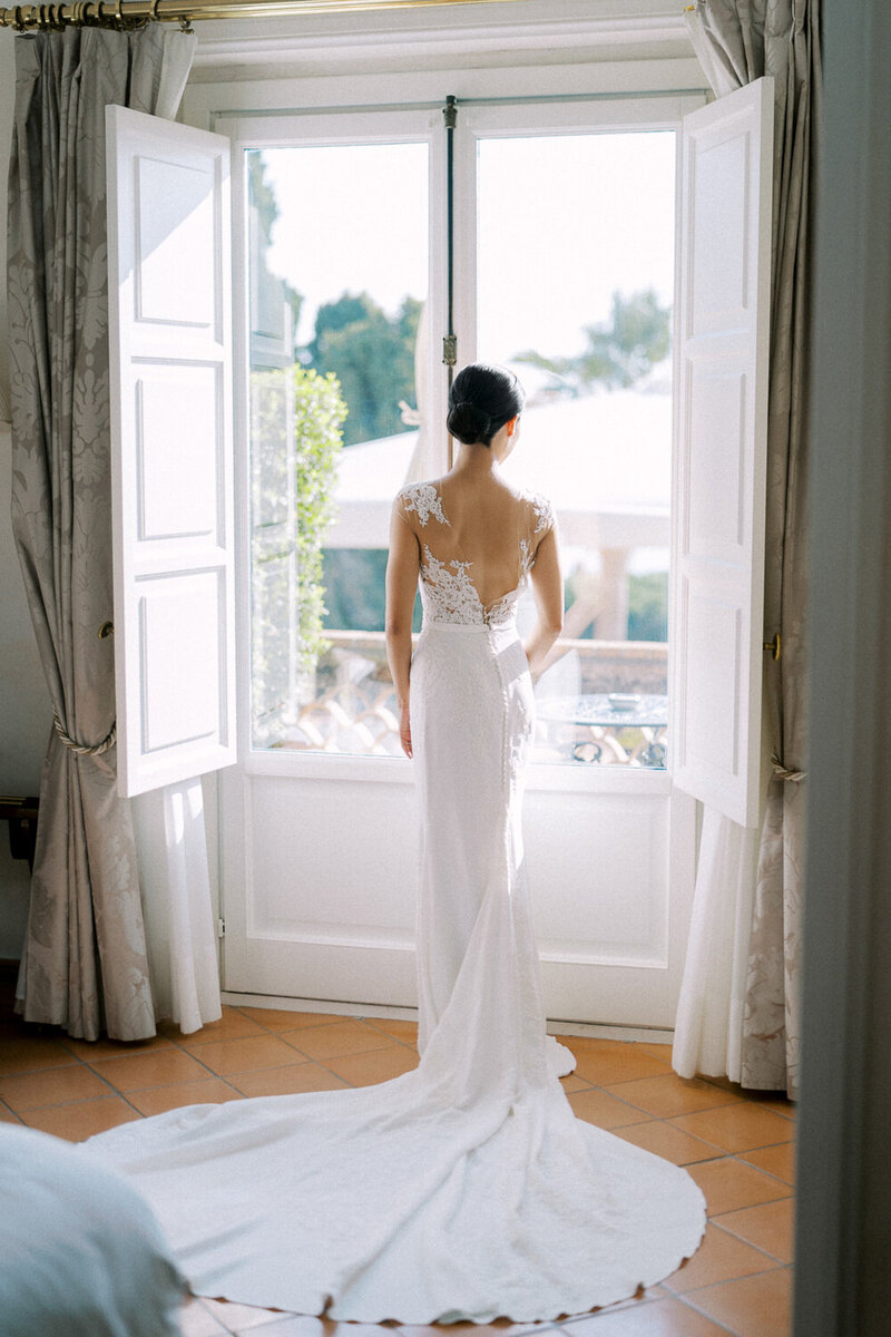 Bridal portraits of a bride in a lace and crepe gown, for a wedding in Montenegro 