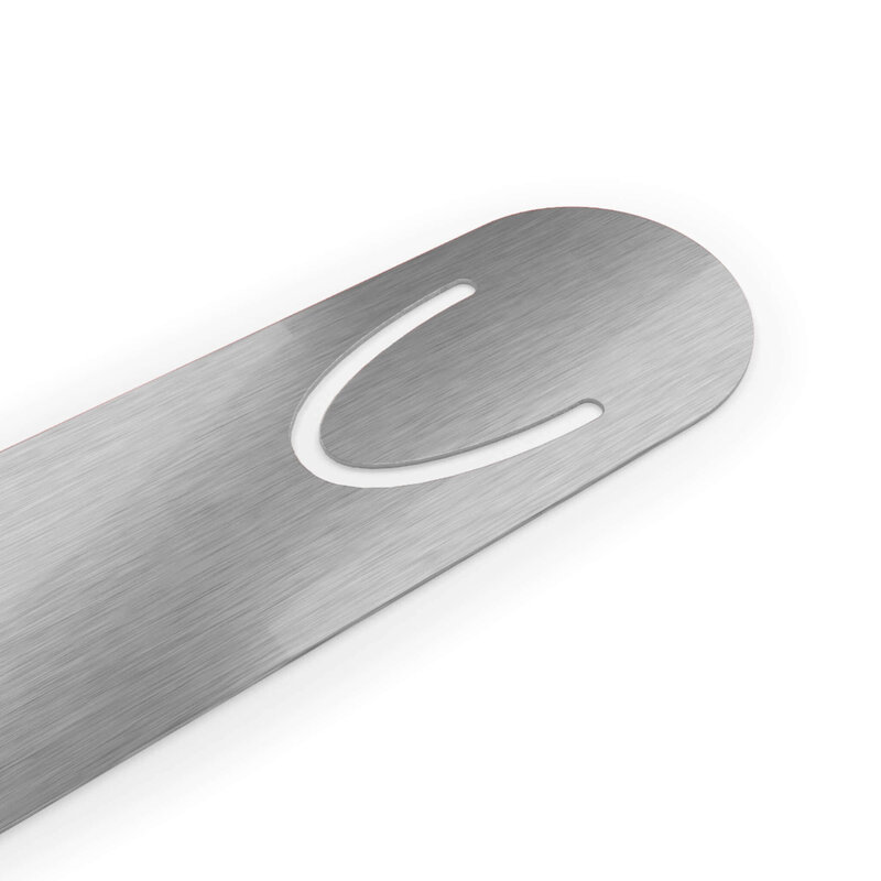 The back of an aluminium bookmark.