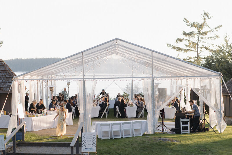 Two brides kissing in wedding dresses