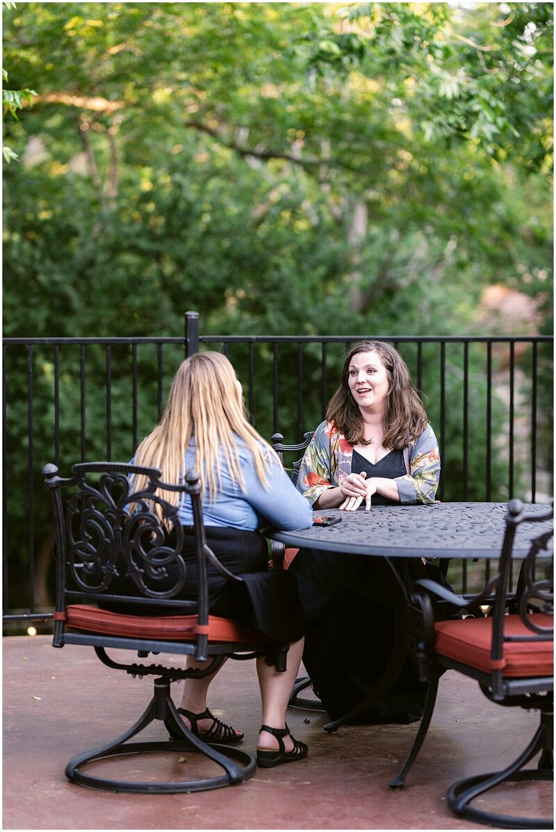 Friends enjoying outdoor terrace area at Messina Inn Hotel