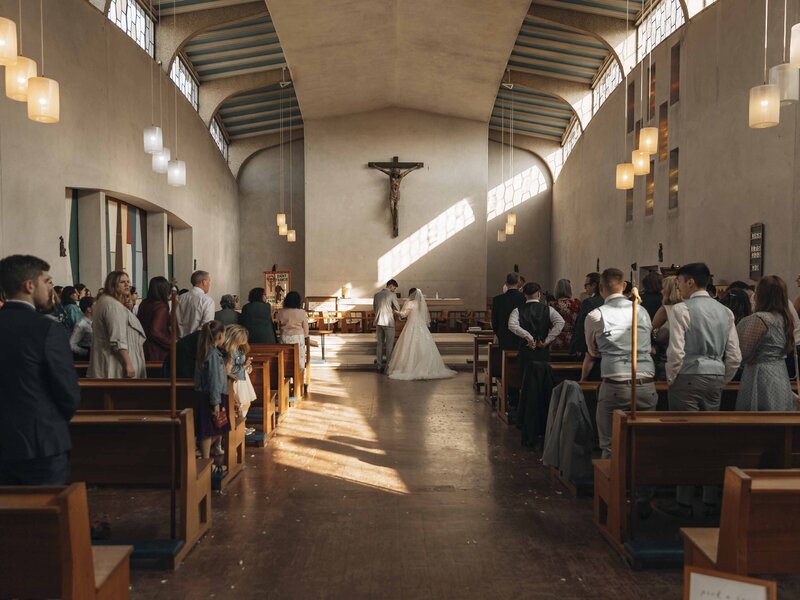 Wide shot of the chuch at a wedding