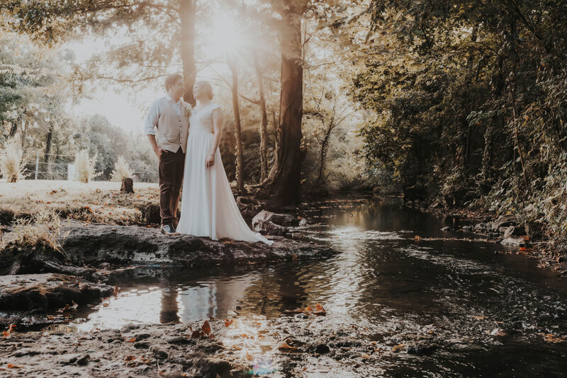 couple by creek
