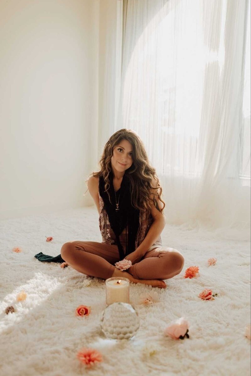 Luna Skye sitting in bright room with carpet