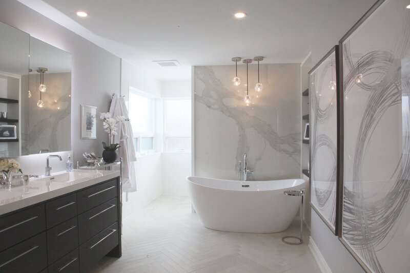Modern bathroom with marble and soaker tub