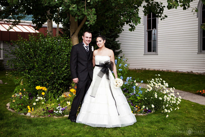 Wedding photos in the front garden of St. Mary's Chapel in Breckenridge Colorado
