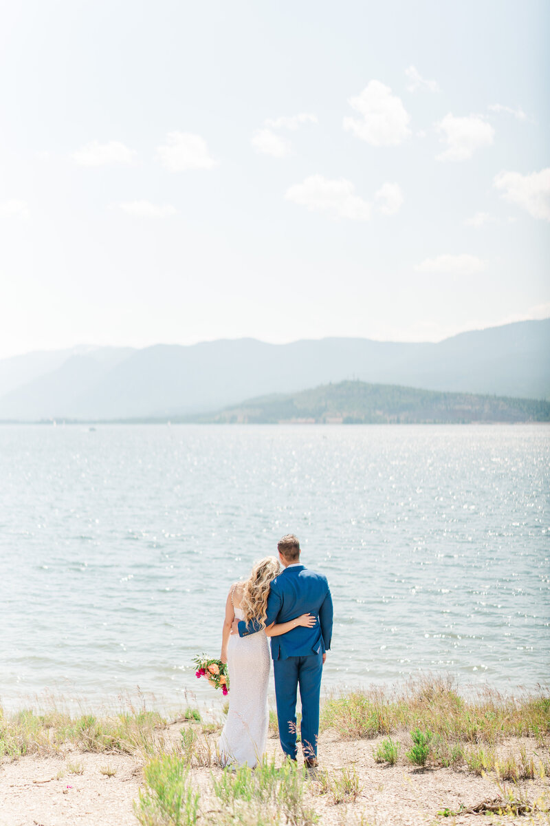 Lake Dillion Reservoir Colorado Elopement Wedding Mountain View Summer Pink and Orange Florals Sparkly Dress Light and Airy Elena Spraguer Photography0119