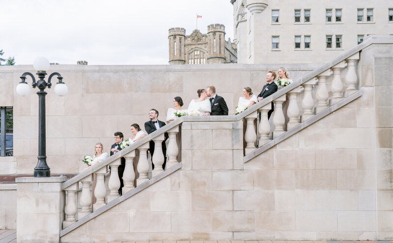 wedding party on stairs of Chateau Laurier Ottawa