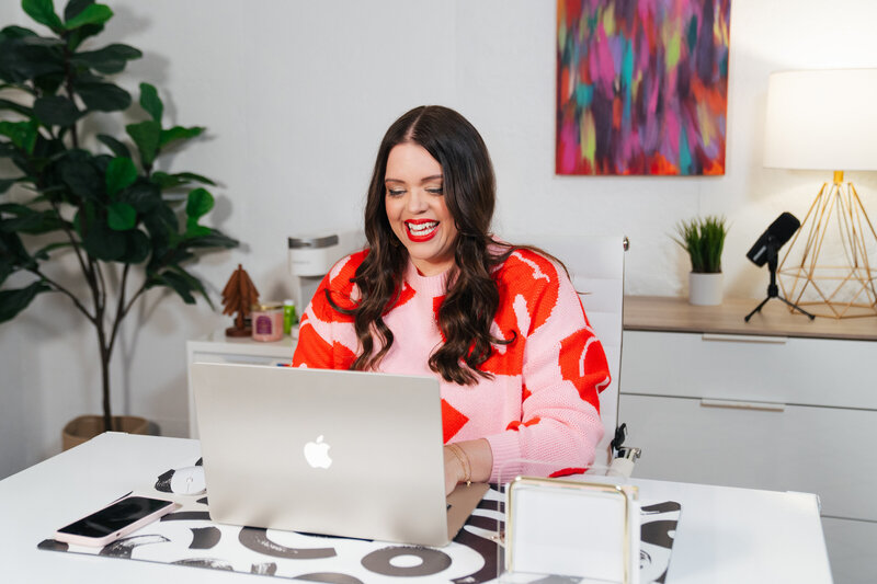 heather crabtree smiling in pink and red sweater
