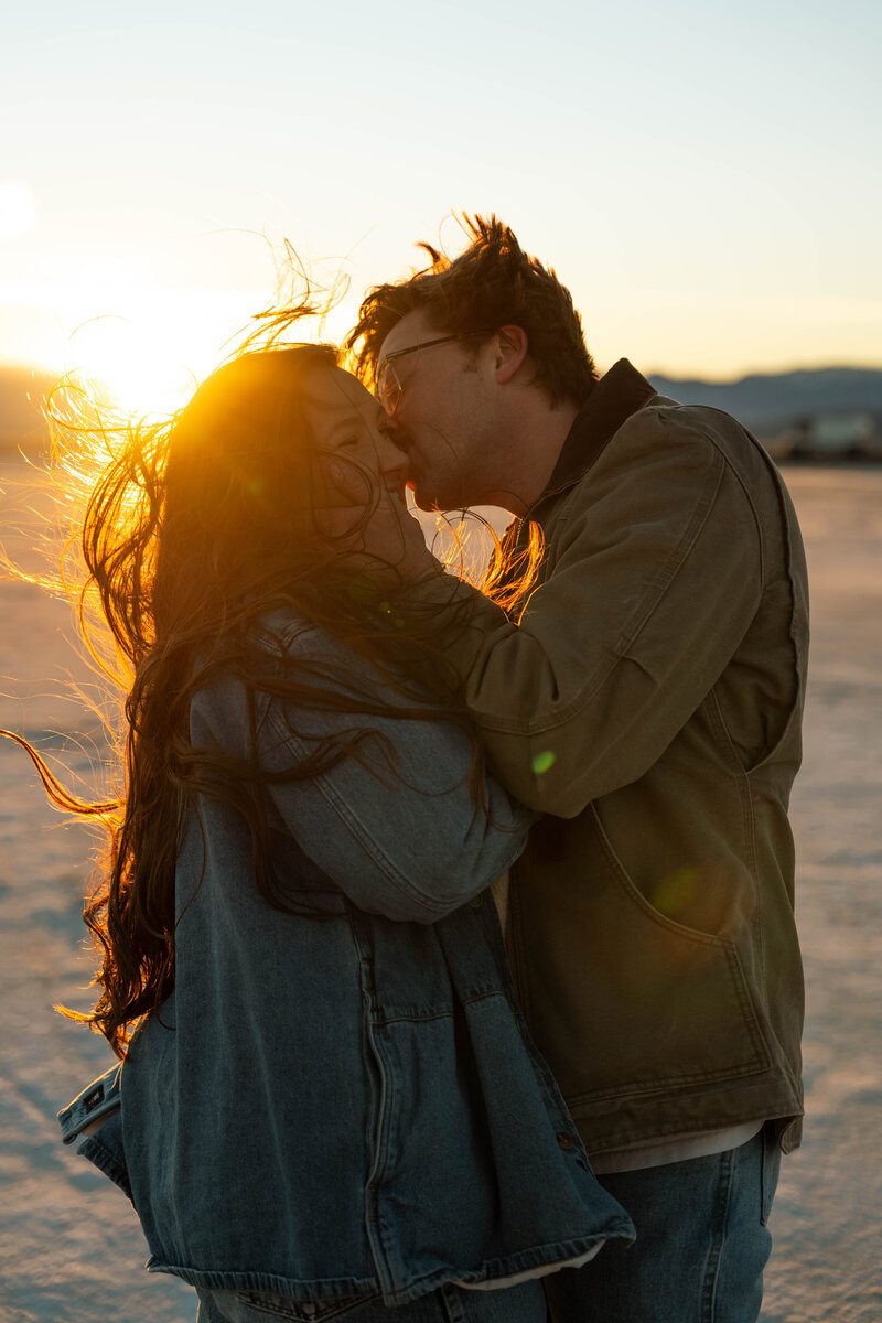 couple kissing on salt flats