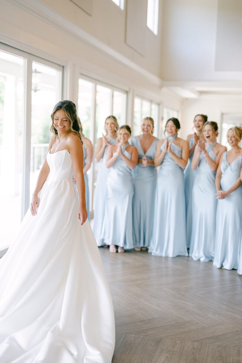 Anya’s first look with her bridesmaids in pale blue gowns