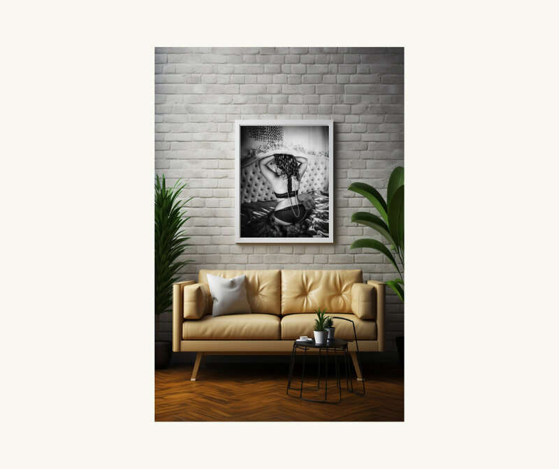 Black and white wall art piece of a boudoir session