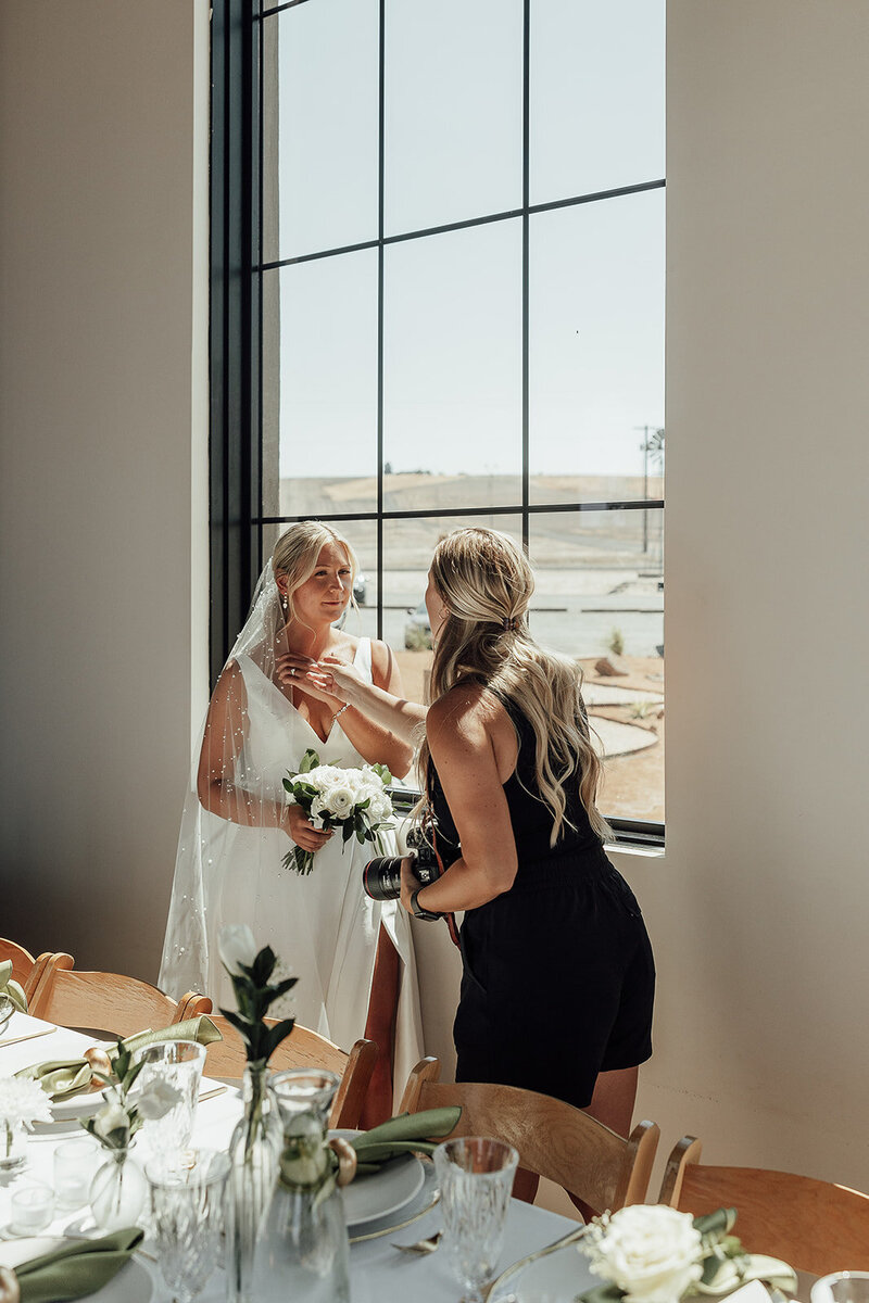 Photo of Corrie Butler with a bride