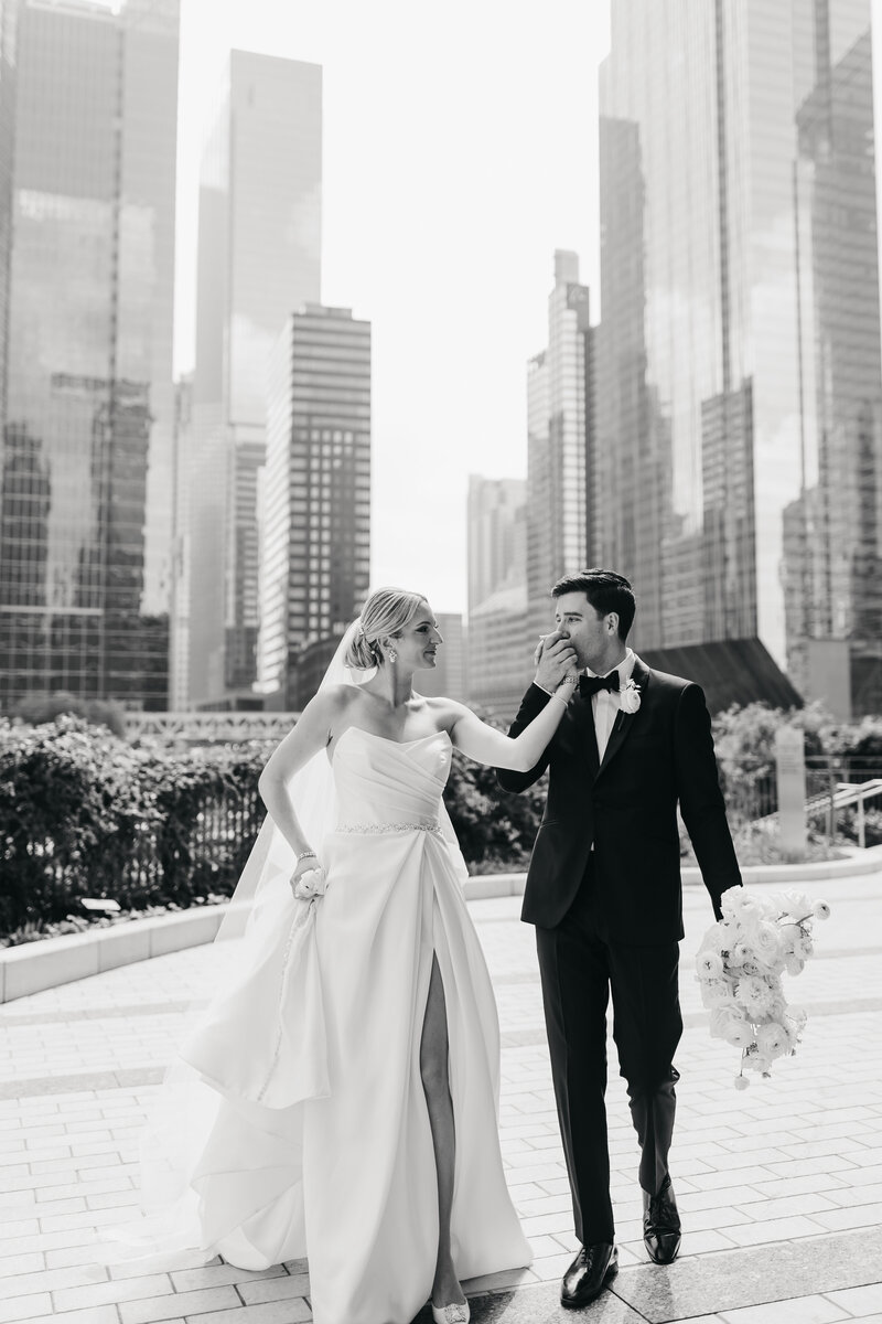groom kisses bride's hand