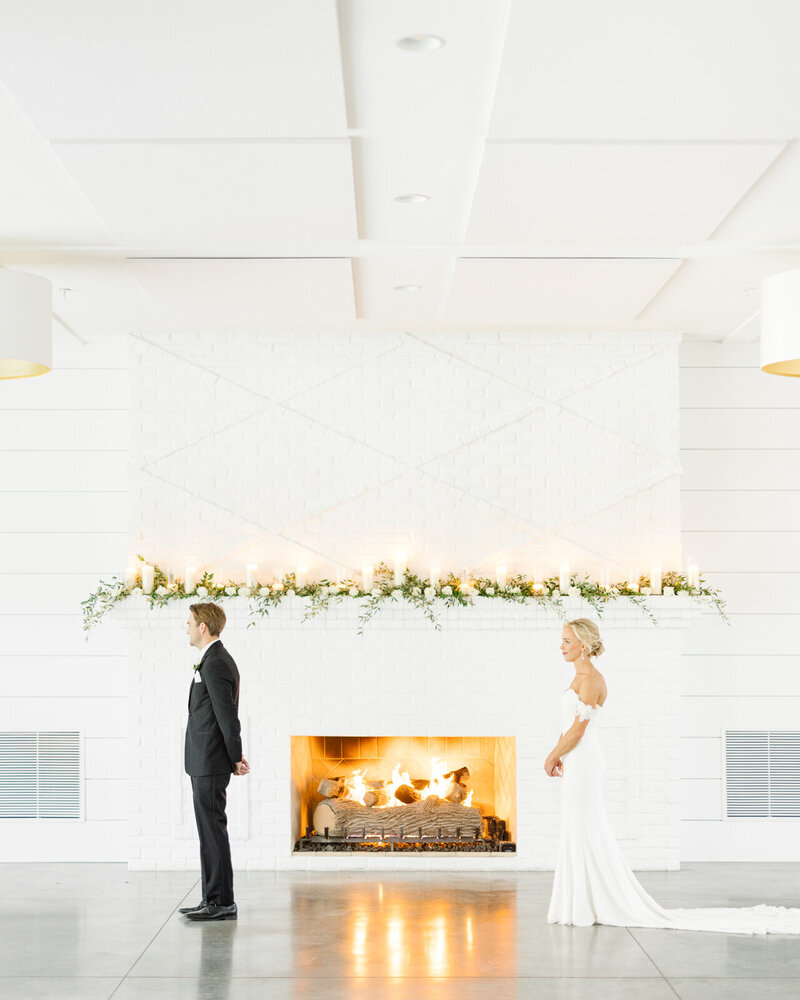 88 Hutton-House-medicine-lake-minnesota-first-look-Fireplace-Bride-and-groom-florals-Wedding