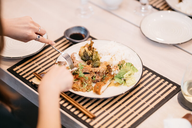 Woman eating catering food