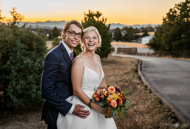 Couples portrait with mountain views at Sunset along the Villa Parker Driveway