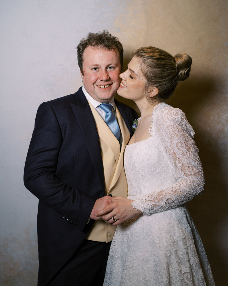 Bride and groom in wedding portrait studio wedding photobooth