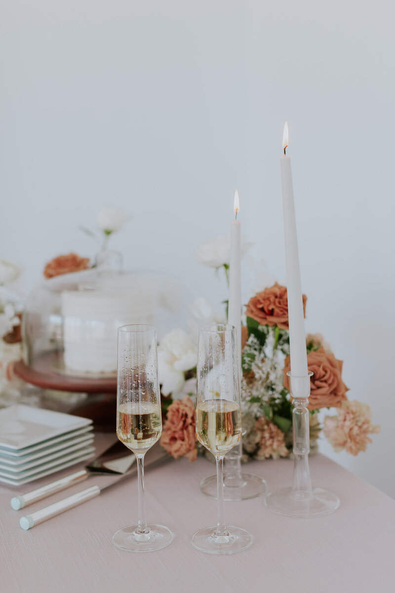 wedding-cake-table-candles-champagne-florals-for-event-planner-brand-session-the-frame-charlotte