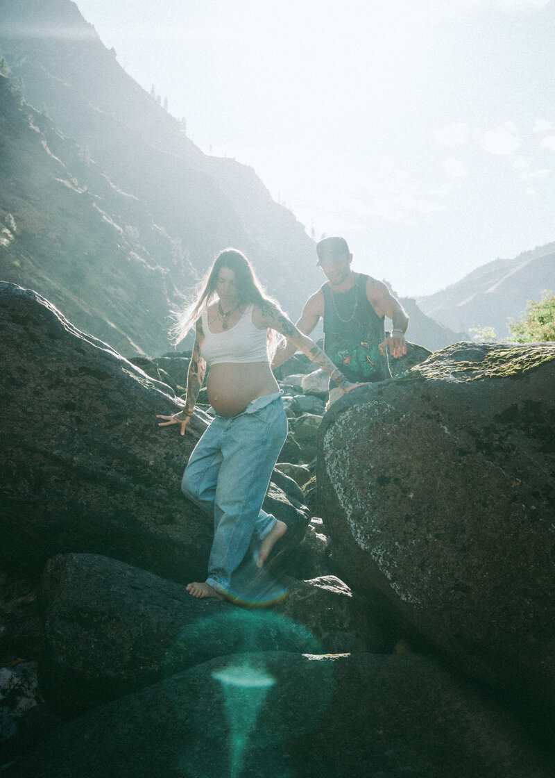 Couple during maternity and engagement golden hour portrait session at Riggins, Idaho wedding - photographed by The Storytellers