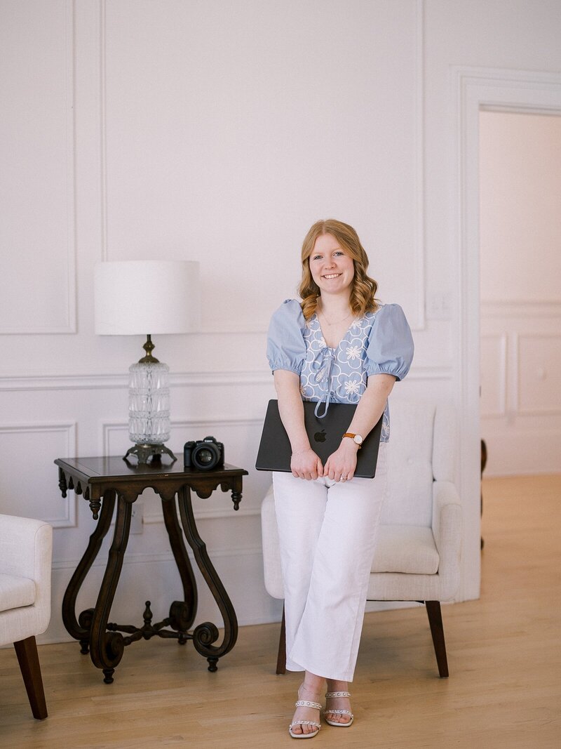 Photographer brand session at The Crest in Winston-Salem featuring a female entrepreneur holding a laptop, captured by Casie Marie Photography.