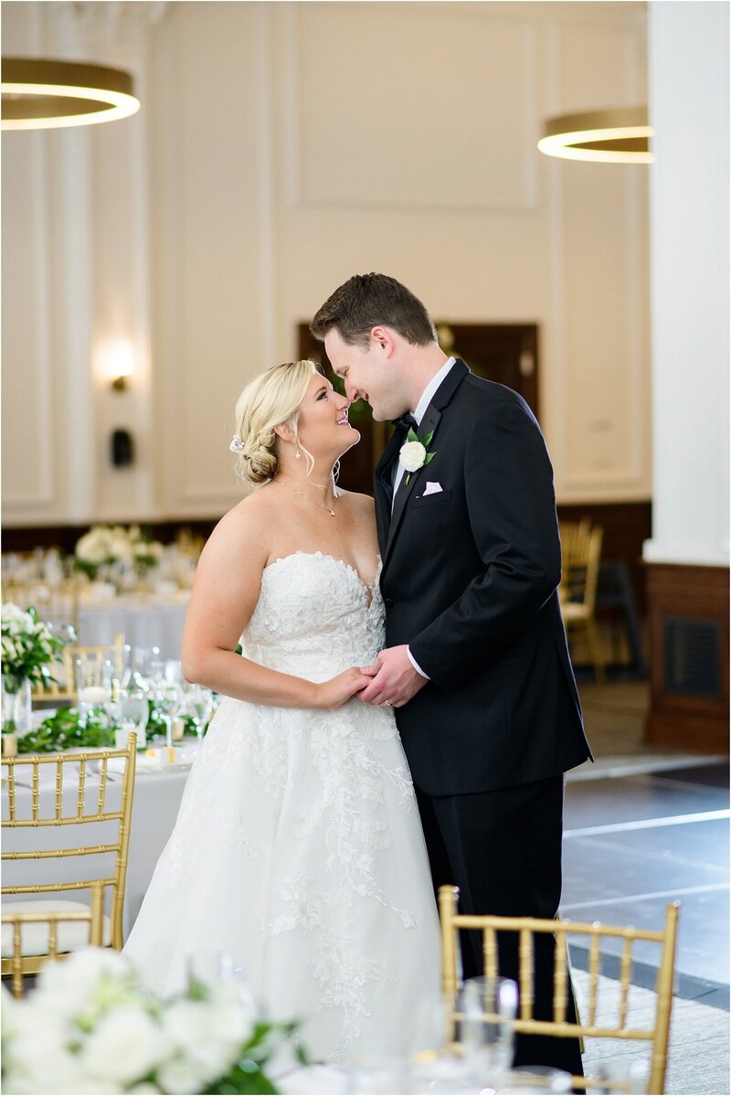 Bride and groom walk up memorial steps at their DC wedding