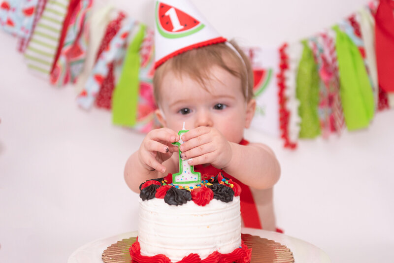 A one-year-old at his cake smash photo session.