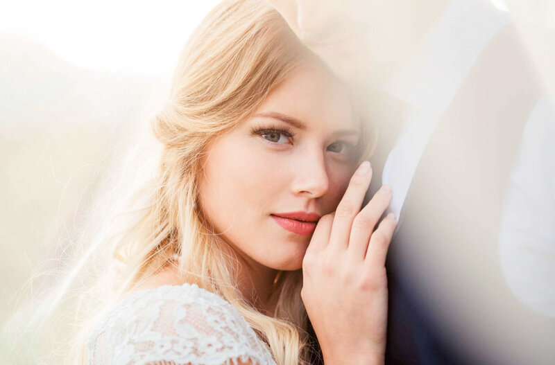 Bride & groom having fun at the four seasons hotel in the lobby at Scottsdale, Arizona.