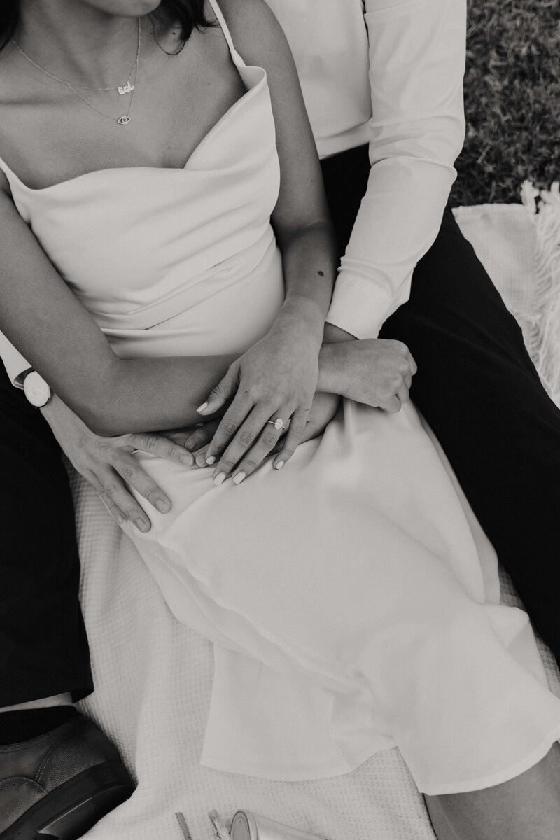 Couple sitting in grass