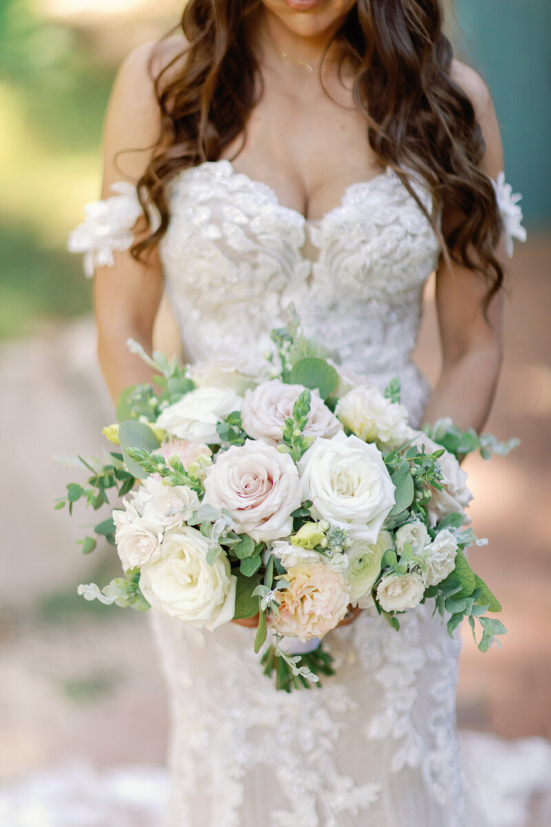 A wedding couple kissing