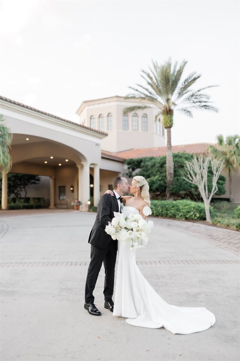 Bride and Groom Portrait on a golf course at the Country Club of Orlando by Orlando wedding photographer
