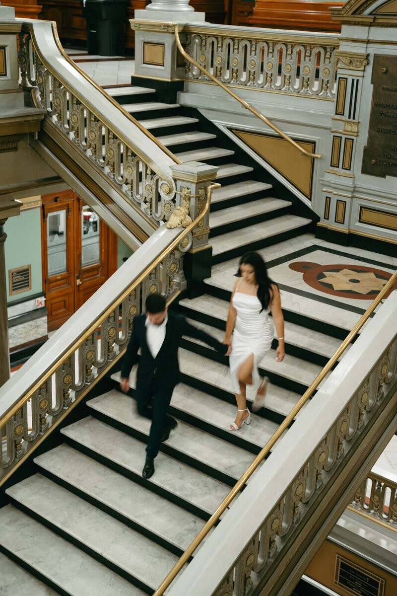 couple taking engagement photos at the Rhode Island City Hall