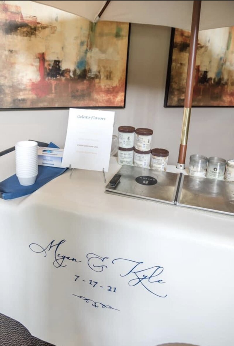 Custom event signage on ice cream cart