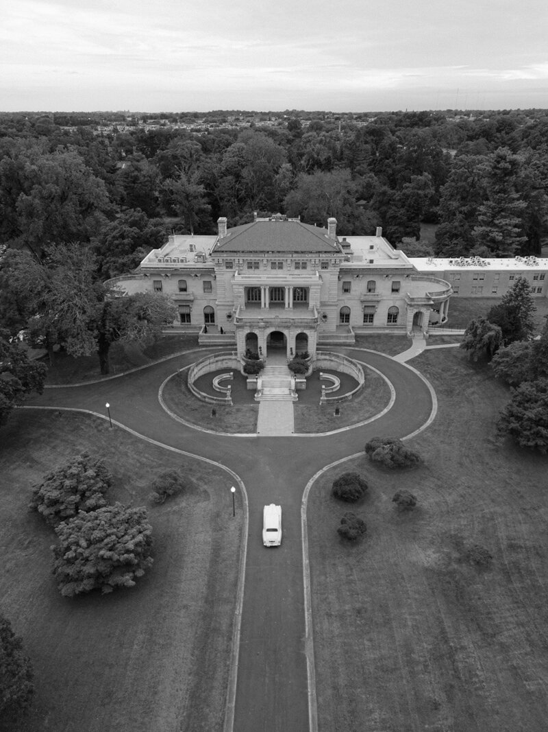 Aerial view of Elkins Estate in Elkins Park, Pennsylvania, with the wedding car on the drive