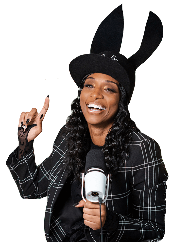 Shaniece Jones laughing and holding a podcast microphone.