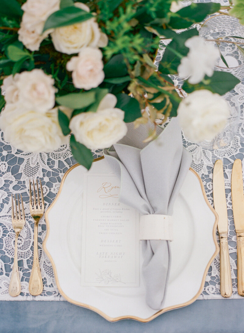 Light blue table setting for Devin and Ryan
