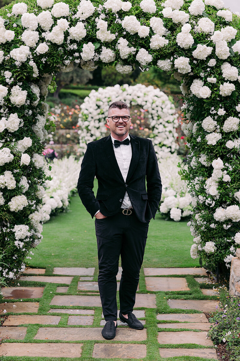 Santa Barbara Wedding Planner,,Tyler Speier in front of white ceremony at San Ysidro Ranch in Montecito