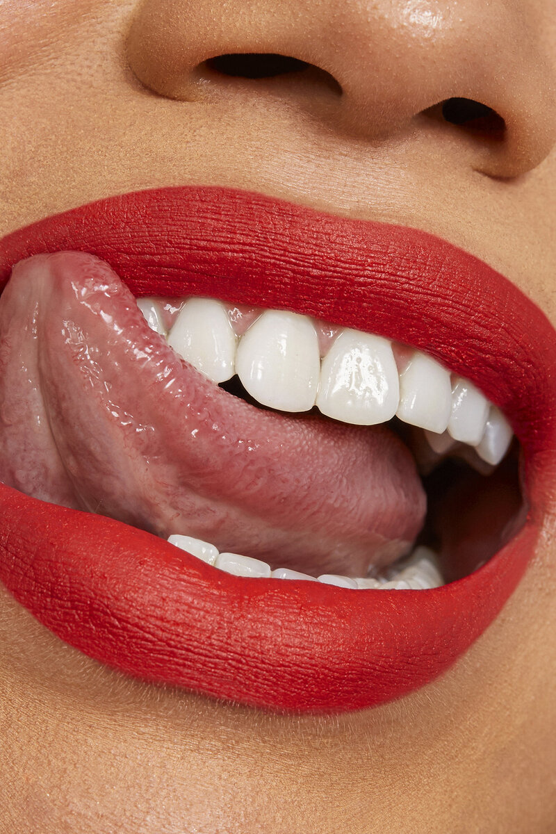 close up woman licking teeth photoshoot los angeles