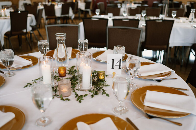 glass cylinder trio with candles and gold chargers