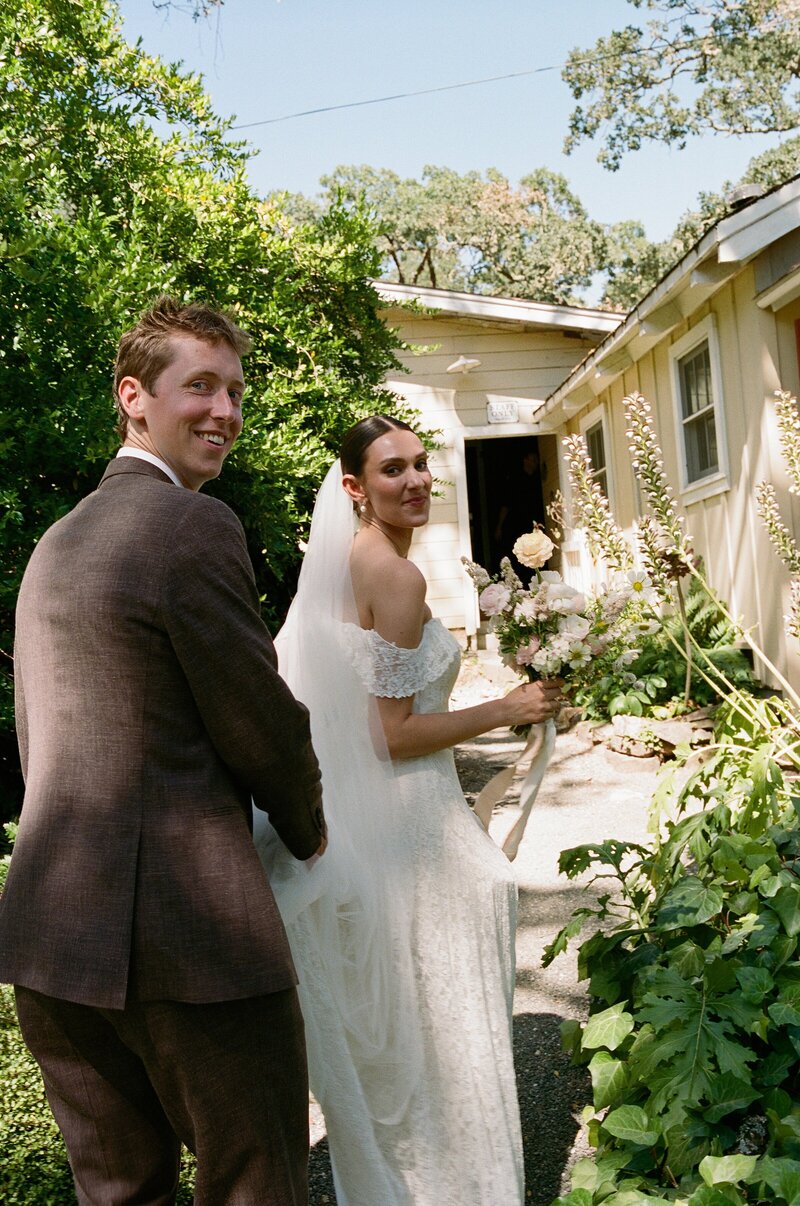 Bride and groom formal portrait at a black tie vineyard wedding