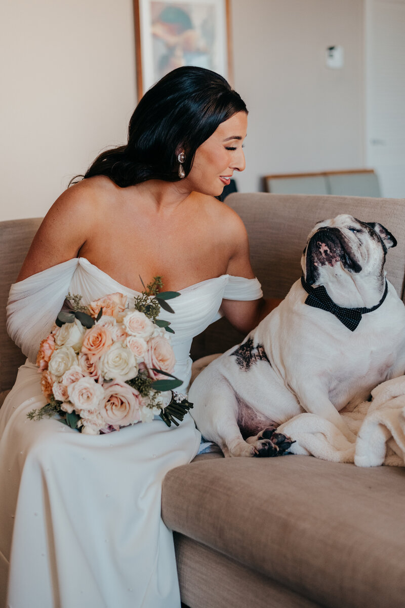 Bride with dog before hilton head wedding
