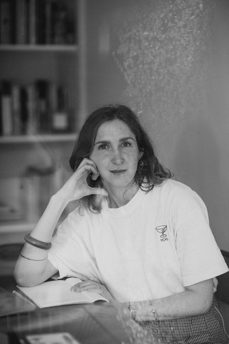 Copywriter looks to camera rom her home office in Oxfordshire